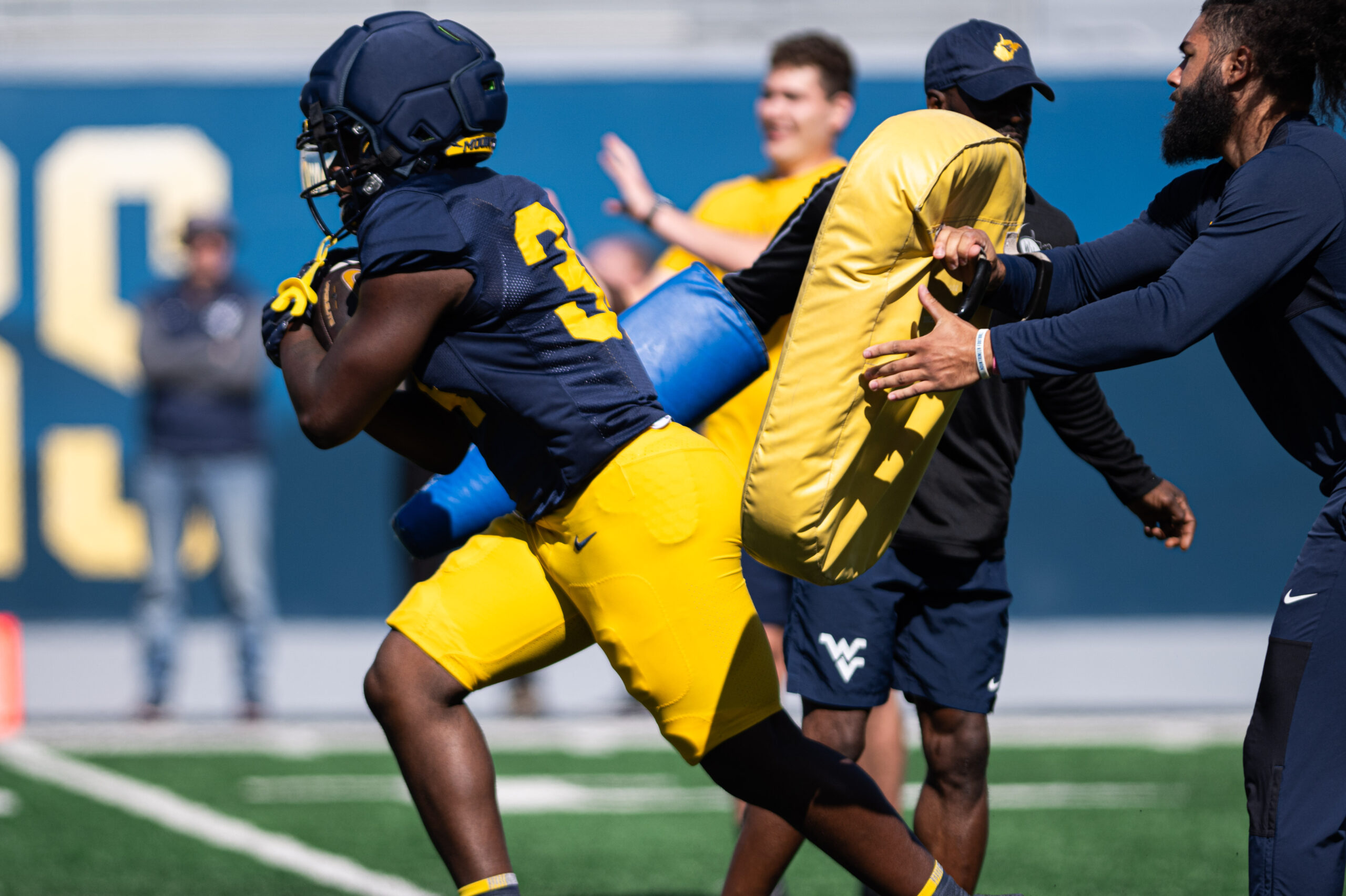 WVU making progress for short yardage situations, adding size, experience